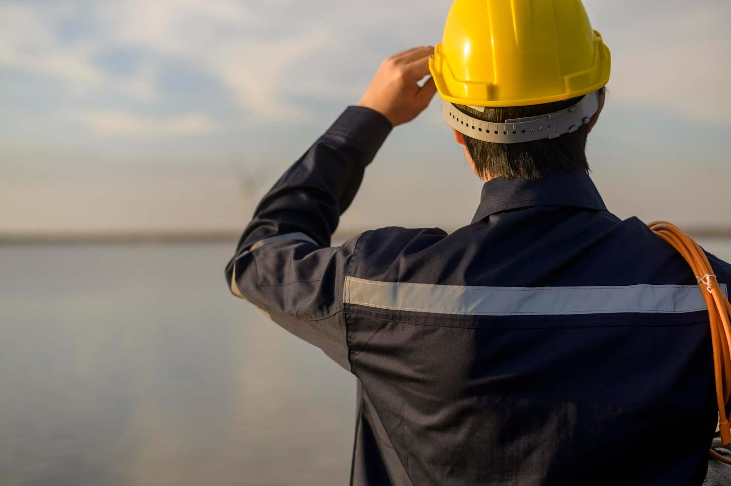 male engineer from a manpower service provider company wearing protective helmet