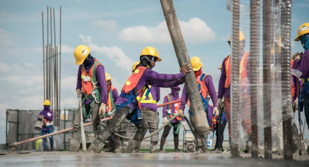 worker in construction attire is performing their job